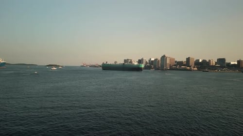 Drone Shot of the Halifax Harbor and a Cargo Ship Calling at Port Canada