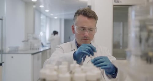 Male scientist working on an experiment in a laboratory