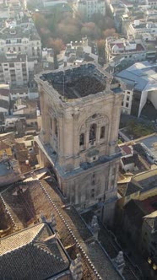 Vertical Drone Orbit Over Granada Cathedral Bell Tower