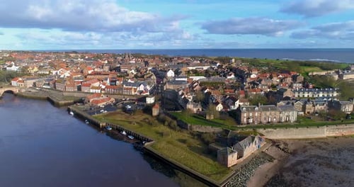 Aerial drop-down shot towards Berwick-Upon-Tweed in England