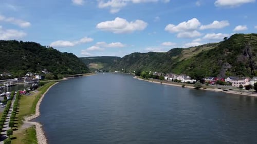 Aerial flying drone shot, panning right, of the Rhine River Valley and Old Architecture - including