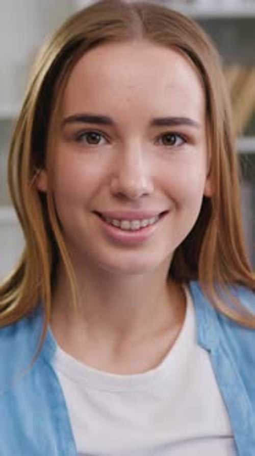 Smiling Young Woman Close Up Portrait in Home Setting