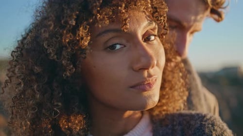 Romantic Couple Embracing in Golden Hour Light