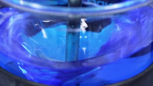 Mixing blue liquid in laboratories