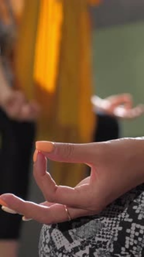 Close up of Woman's Hand in Yoga Pose