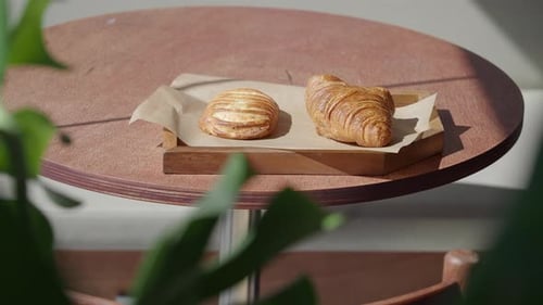 Delicious Pastries on a Sunny Table in a Cafe