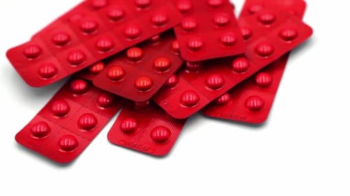 Pile of Red Pill Blister Packs, Zoom Out