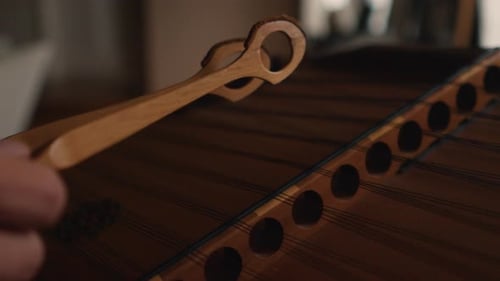 dulcimer classic instrument, traditional music, extremely close up of string hammering
