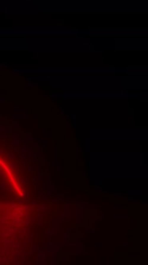 Neon tube lights illuminate a 3D animated concrete corridor with a sci-fi ambiance.