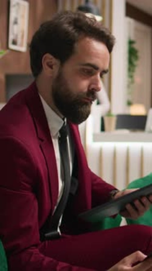 Vertical Video Business Associate Analyzes Data
