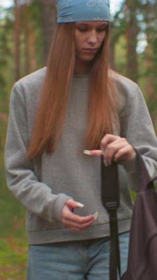 Tired Hikers Walk Through Peaceful Forest Preparing to Rest