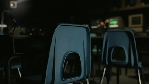 A Row of Blue Chairs Sitting Next to Each Other