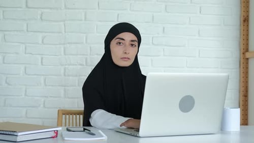 A Woman in a Black Hijab Teaches at the University a Muslim Woman Professor of Natural Sciences is