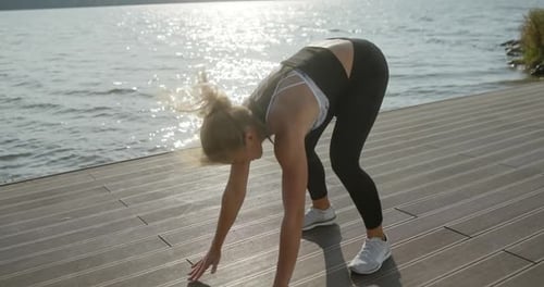 Slim Sportswoman During Training on Quay