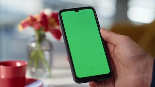 User Hand Holding Mockup Smartphone at Cozy Restaurant Closeup Manager Online