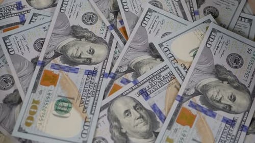 Close Up View of Pile of 100 Dollar Bills