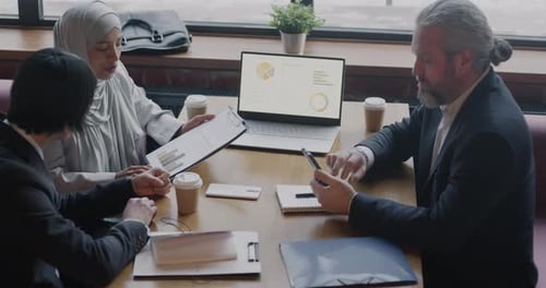 Diverse Business Team Collaborating on Strategy