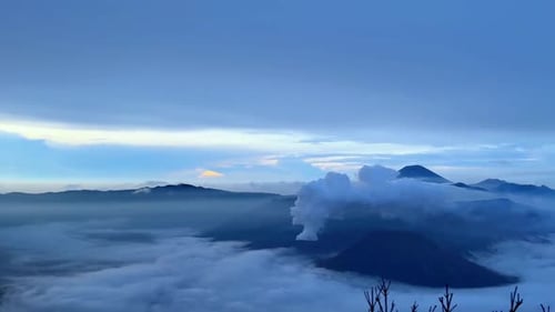 View of Bromo Tengger Semeru National Park in foggy and cloudy morning. Seen sea of clouds.