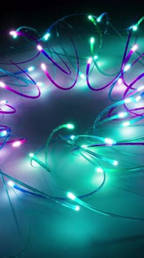 Vibrant multicolored fiber optics in 3D loop.