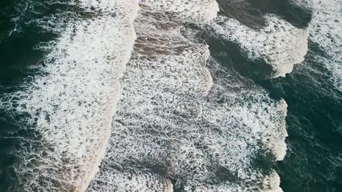 Drone Shot Top View Beautiful Texture of Big Power Dark Ocean Waves with White
