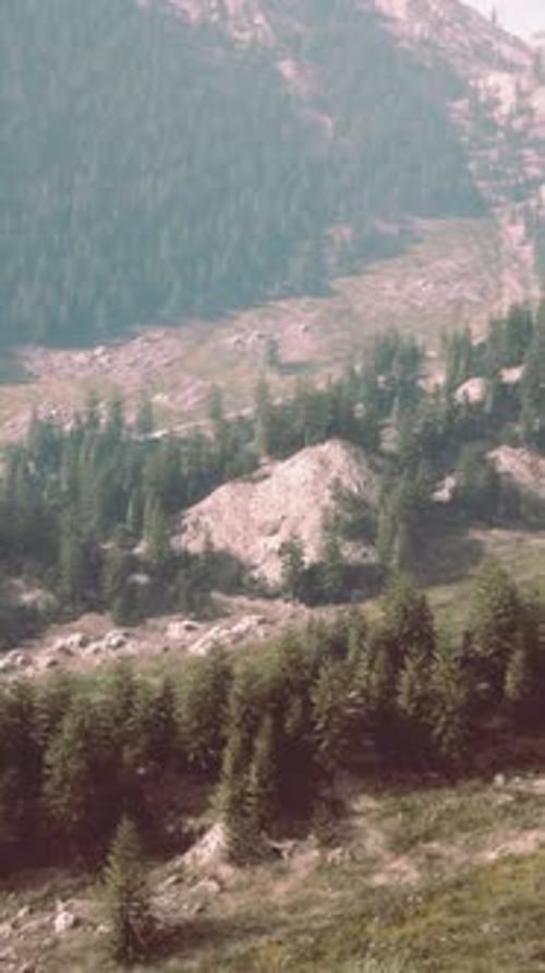 A Scenic Mountain Road Cutting Through Breathtaking Landscapes