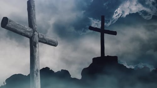 Silhouette of Wooden Crosses Against Dramatic Sky
