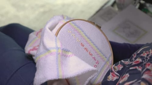 Woman Doing Needlepoint at Home, Close Up