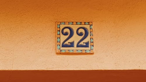 Number 22 (twenty-two) Affixed to a Building