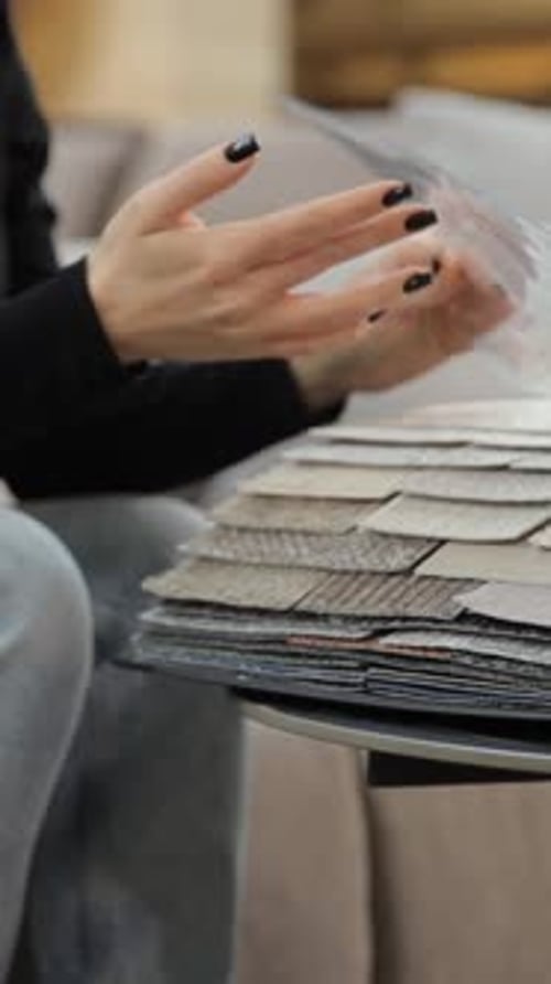Vertical Video Customer Chooses a Color in a Furniture Store Discounts on Goods Black Friday