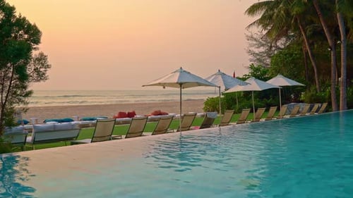 chair pool around swimming pool - holidays and vacations concept