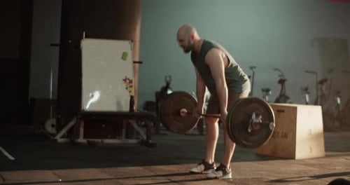 Athletes Doing Intense Workout in Fitness Club