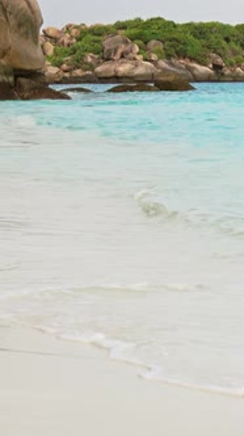 White sand beach between rocks on Similan islands