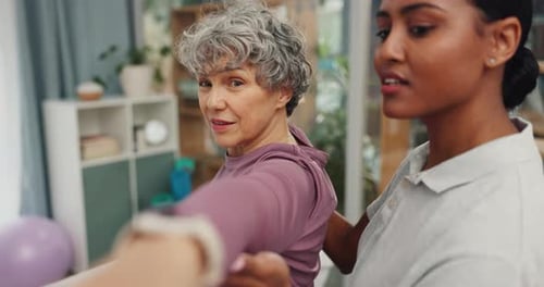 Senior Woman Working With Healthcare Worker