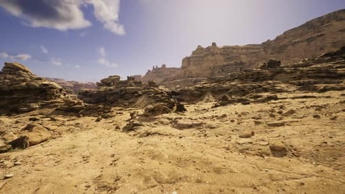 Flying Through Arid Rocky Desert Landscape