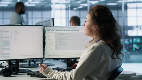Smiling Manager in Server Hub Using Computer to Find Firewall Misconfigurations