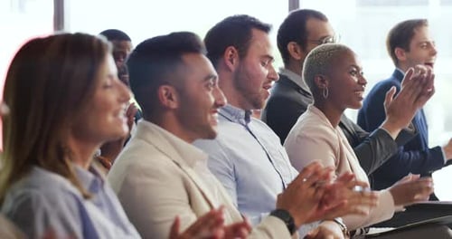 4k video footage of a group of young businesspeople clapping during a conference in a modern office