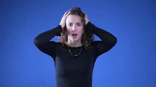 Surprised Woman Reacts to Shocking News