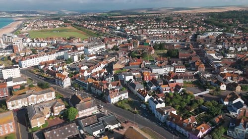 Aerial View of Coastal City with Red Rooftops