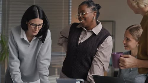 Creative Multiethnic Female Business Team Coworking in Office