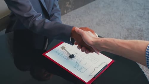 Negotiating a Deal in a Modern Office During a Business Meeting
