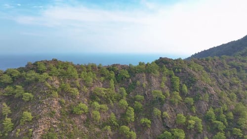 Camera Slowly Pans to the Right Revealing a Beautiful Mediterranean Coastline with Turquoise Waters