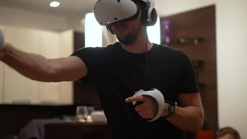 Man Immersed in Virtual Reality Experience at Home