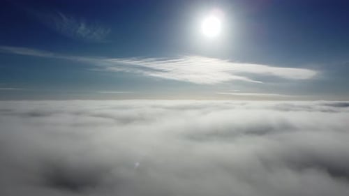 Aerial View of Fog Above Clouds