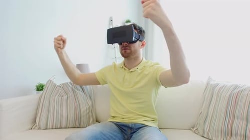 Happy Gamer Immersed in Virtual Reality