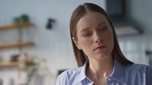 Serious Girl Reviewing Paperwork in Home Office Closeup Portrait Businesswoman