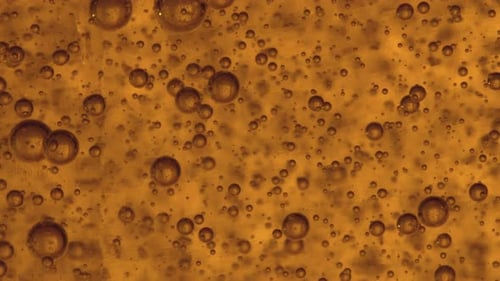 Textura espessa com bolhas crescentes de um gel. De perto, Macro