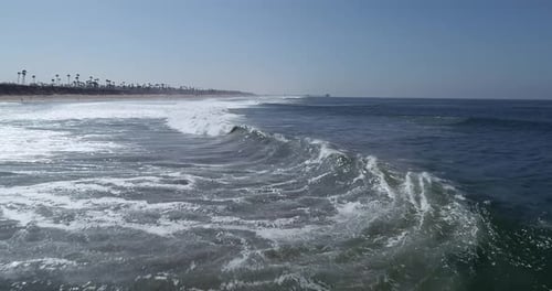 Waves Breaking Along The Coast