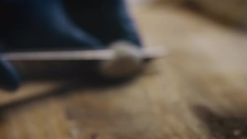 Two Whole Unpeeled Boiled Eggs and Two Slices of Eggs Isolated on a White Background