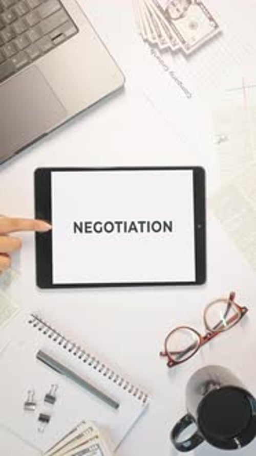 VERTICAL VIDEO OF NEGOTIATION DISPLAYING ON A TABLET SCREEN