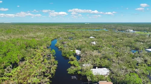 Heavy Flood with High Water Surrounding Residential Houses After Hurricane Ian Rainfall in Florida